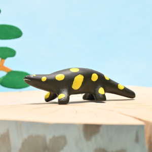 Hand-painted wooden newt figurine from above, natural wood toy for Waldorf play